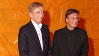 Bernard Arnault and Pietro Beccari attend the Louis Vuitton Womenswear Spring/Summer 2024 show as part of Paris Fashion Week on 2 October 2023 in Paris, France.