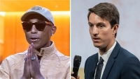 L'artiste et styliste Pharrell Williams et le DG adjoint de Moët Hennessy, Alexandre Arnault.